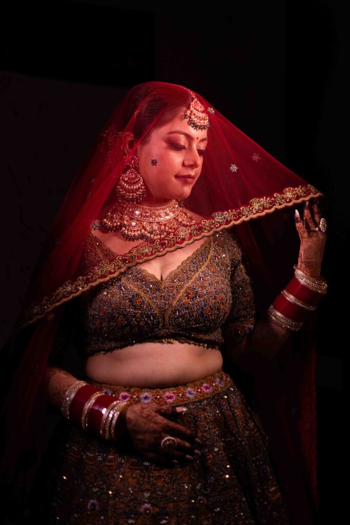 Graceful bride's wedding portrait captured by renowned wedding photographer in Ujjain | Harsh Studio Photography